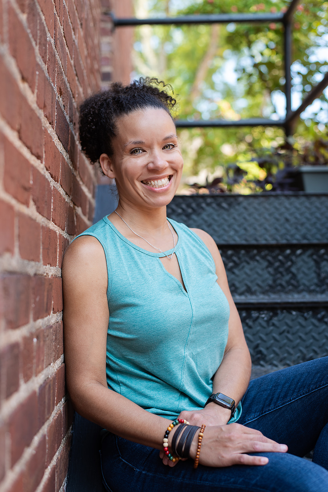 Photo of Brianna Harwood in a blue shirt.
